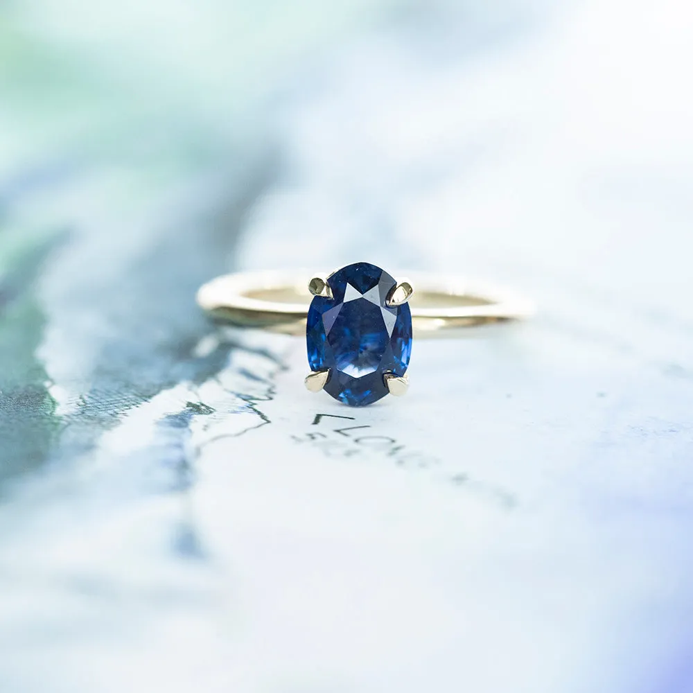 1.53ct Oval Royal Blue Sapphire Solitaire Ring In 14K Yellow Gold