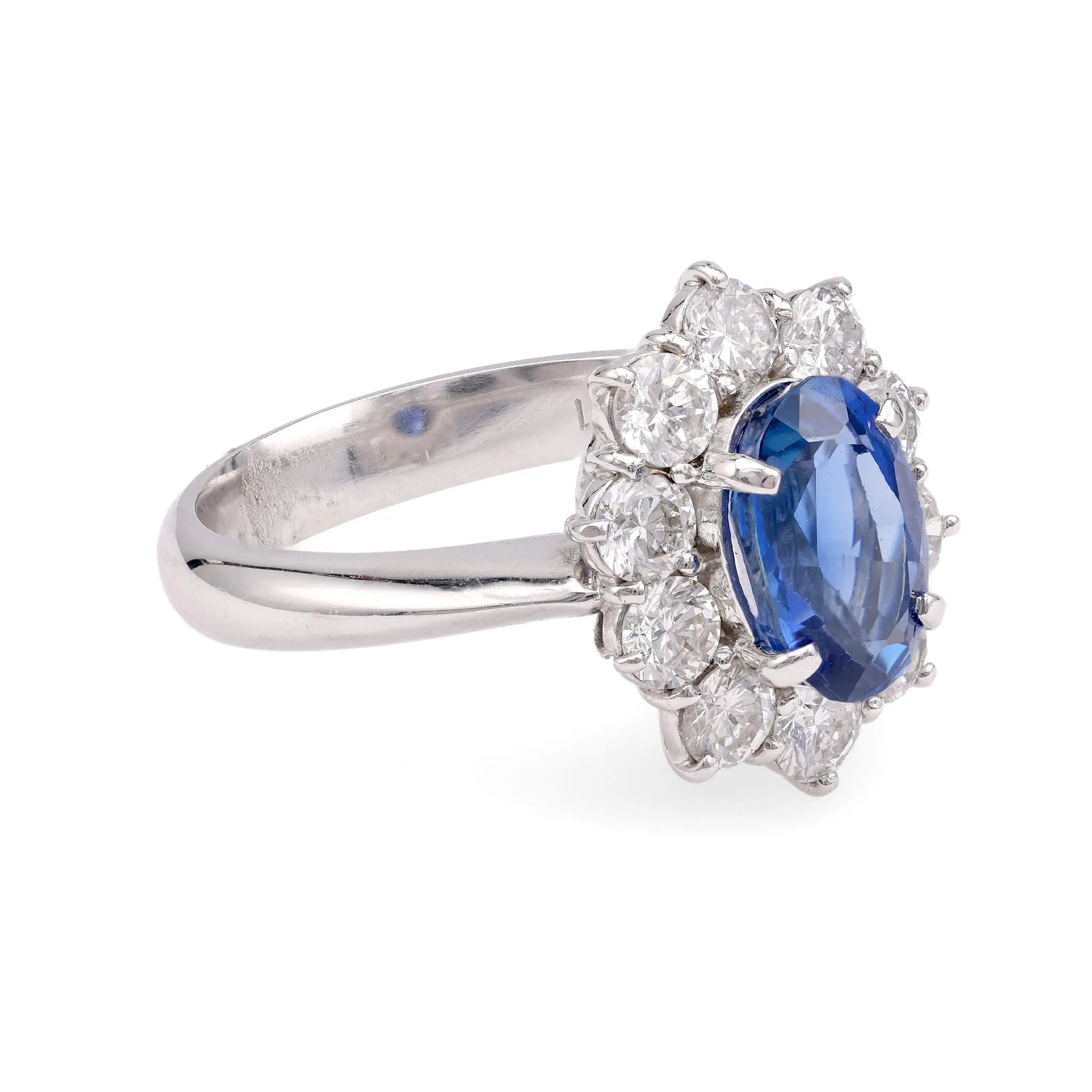 Modern Platinum Sapphire & Diamond Halo Ring