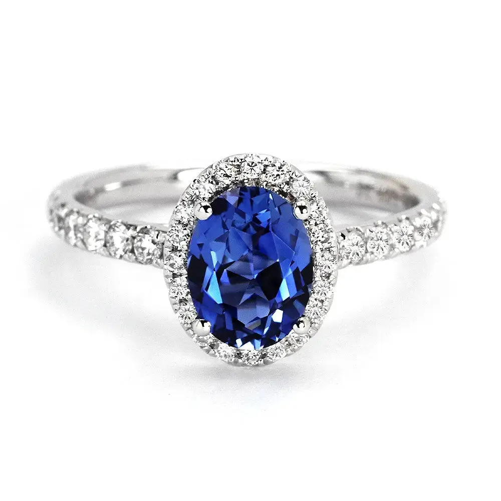 Royal Blue Oval Lab Grown Sapphire with Halo Ring in 18K Gold